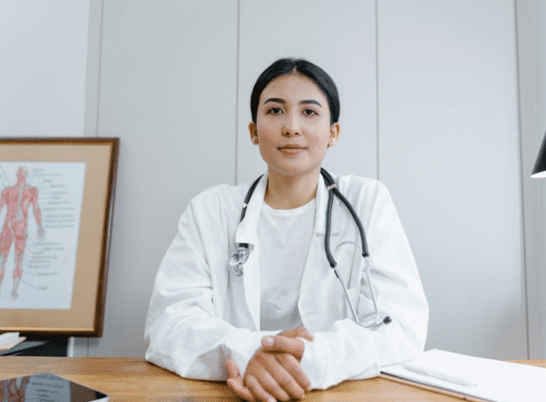 Woman doctor at desk