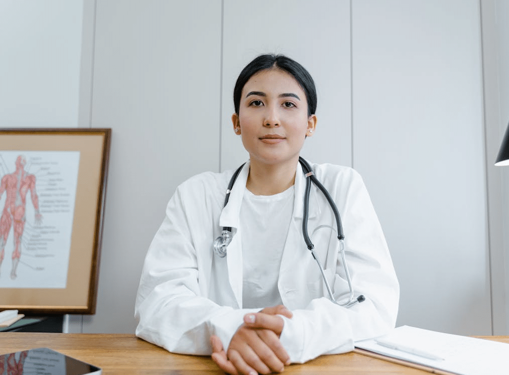 Woman doctor at desk